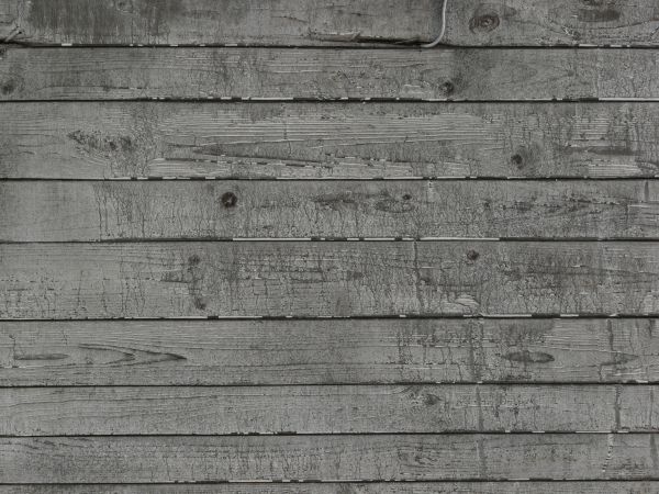 Rustic grey planks set horizontally with water marks.